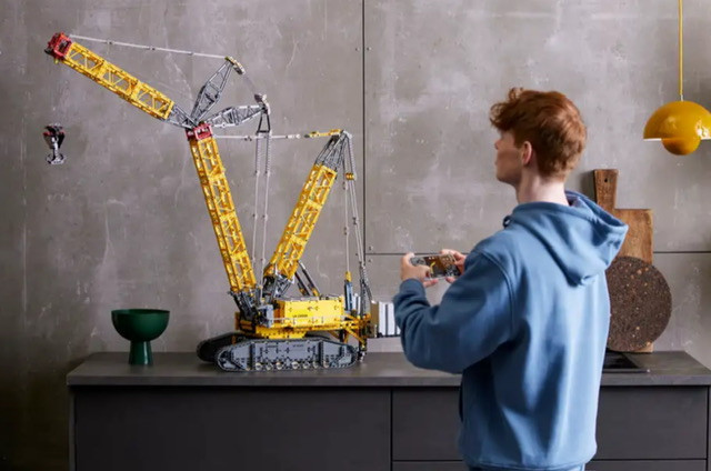 Young Adult shown Playing with the Lego Crawler Crane, Link To Amazon marketplace 