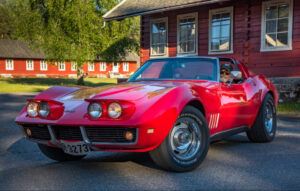 Retired person looking for part time work, picture of an older man sitting in his red corvette.