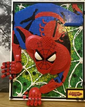 Photo image of the Lego Spider-Man Art set displayed on a wall.