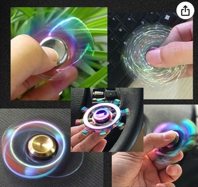 Image of Rainbow Fidget Spinners 5 Pack, revealing 5 ways to play. Image links to amazon marketplace.