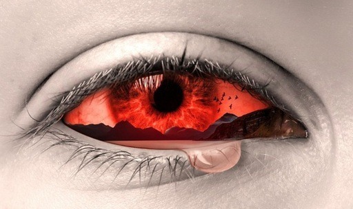 Stress Relief Toys For Adults: Image of a teary blood shot eye, depicting stress