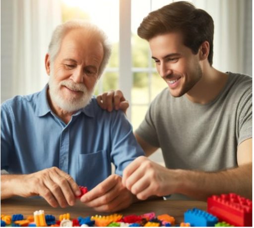 A senior man and a young adult, possibly his grandchild, sit at a table engaged in building with LEGO bricks. The scene shows the man, recovering from a stroke, placing a brick with improved dexterity, assisted by the smiling young adult in a supportive, well-lit environment.